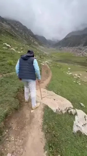 Walking a path through green mountains